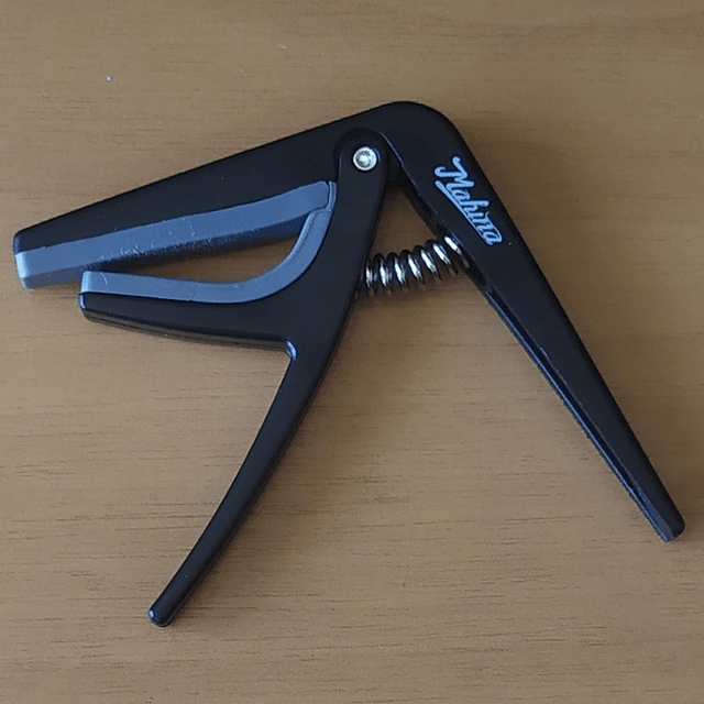 Braçadeira Capotraste para ukulele Cód 711